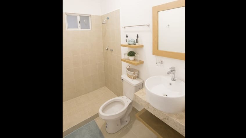 Bathroom with a shower cabin at Porto Cristo Condos