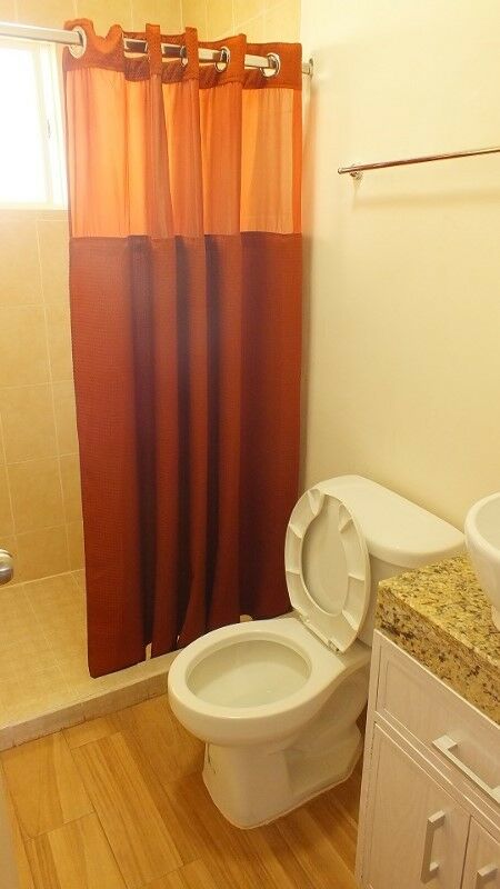 Bathroom with a toilet and shower at Real Bilbao