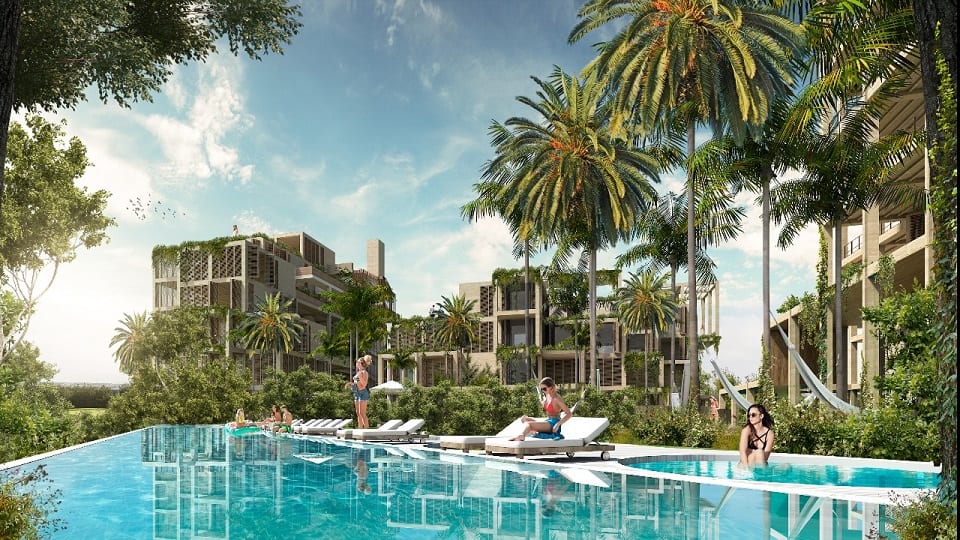 Swimming pool with residential building surrounded by palm trees at The Village Residence