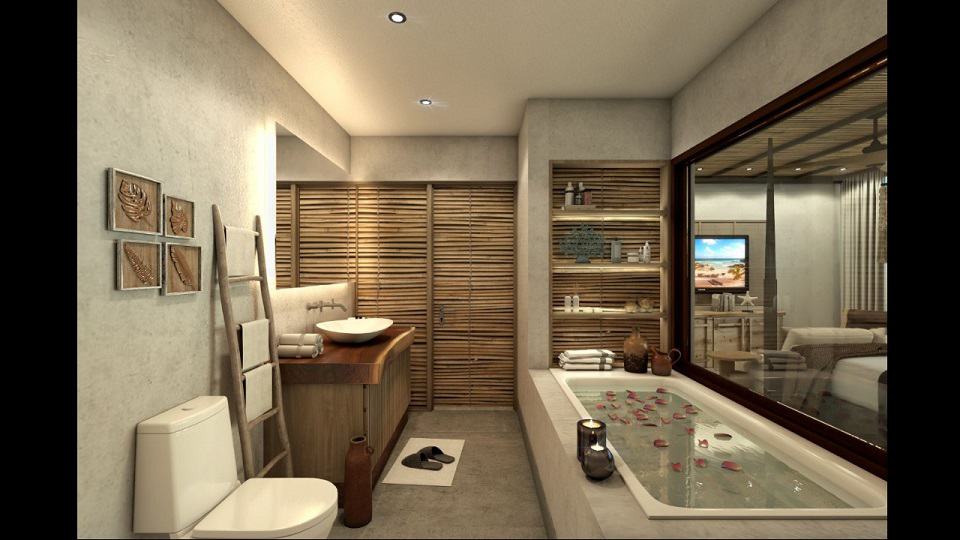 Bathroom with bathtub and water rose petals at Tankah 52