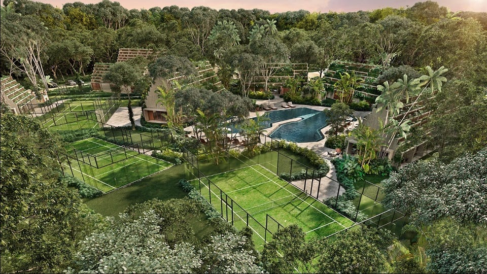View of recreation area with tennis courts and pool at Kaybe Tulum