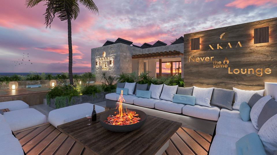 Fire pit with sofas around at Xkaa Ocean View Condos