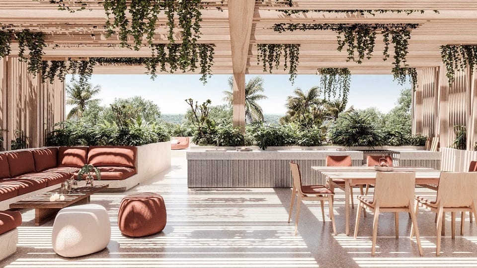 Penthouse terrace, pool, large table and lounge area at Aflora Tulum
