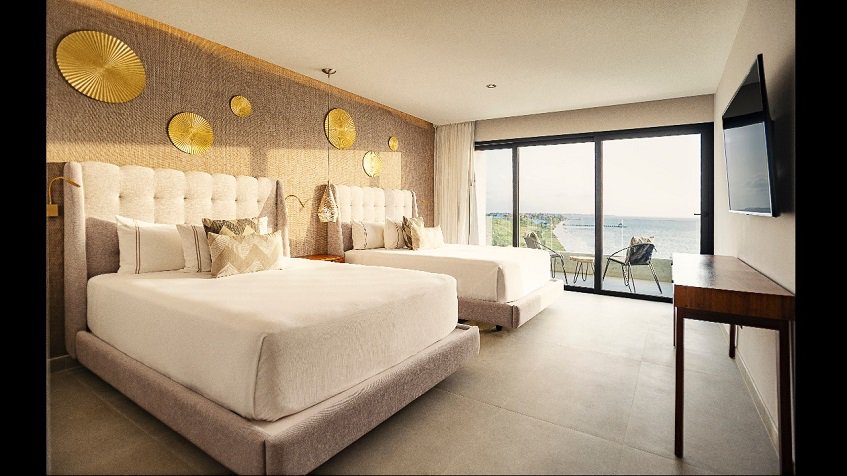 Two beds bedroom with ocean view terrace at The Fives Oceanfront