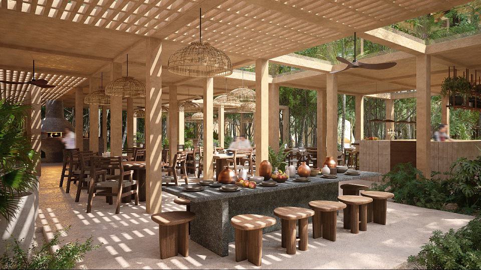 Open door restaurant and dining tables at Aflora Tulum