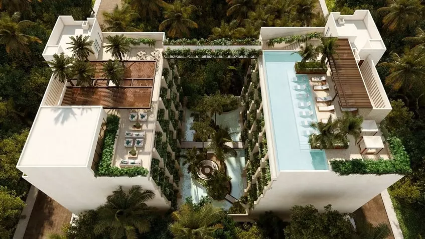 Aerial view of residential building with pools and green areas at Syrena Studio Living