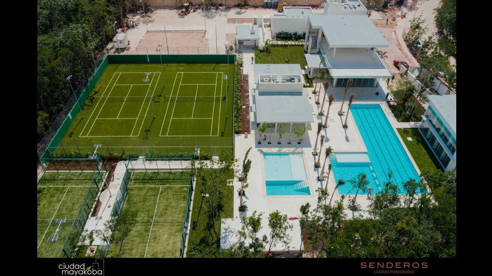 Aerial view of tennis court and pool at Senderos Mayakoba