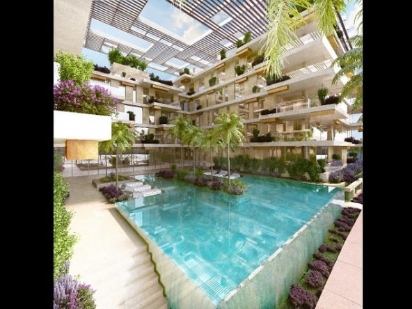 Pool and residential building with balconies around at Alba Marina