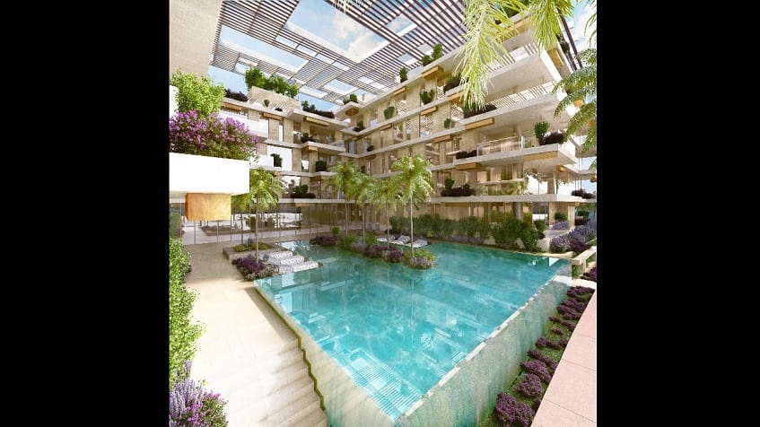 Pool and residential building with balconies around at Alba Marina