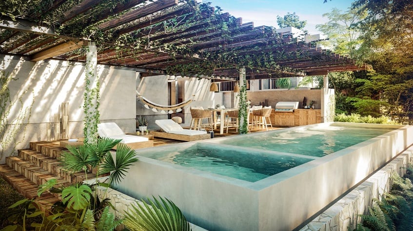 Long swimming pool by the bbq grill and sitting area of Mar y Miel Tulum