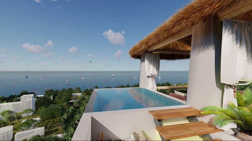 Rooftop pool, palapa and ocean view at Nativo Cozumel