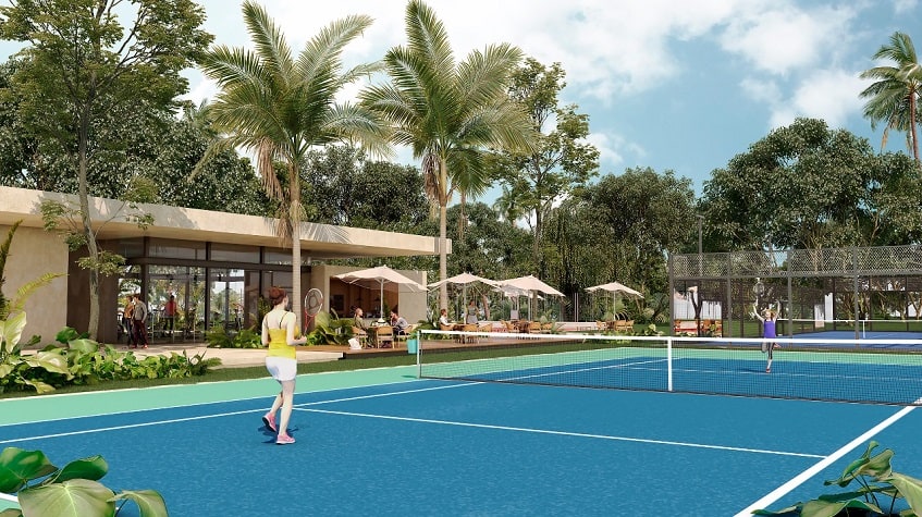 Tennis court and two women playing at Xpu-Ha Beach Residential Resort