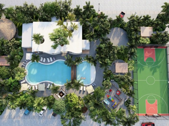 Top view of club house with a pool and basketball court at Grand Privada Tulum