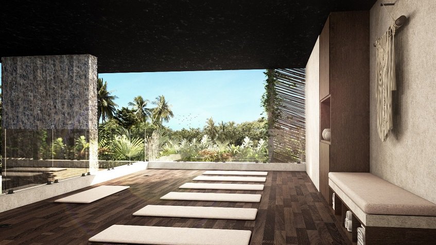 Open yoga room by the garden with excercise matts at Maria Tulum by Anah