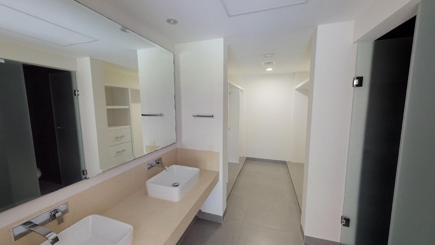 Double sink bathroom with shower cabinet at Nick Price Residences