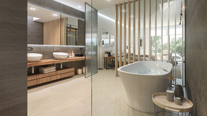 Double sink and bathtub bathroom with glass wall inside a bedroom of Reserve at Mayakoba