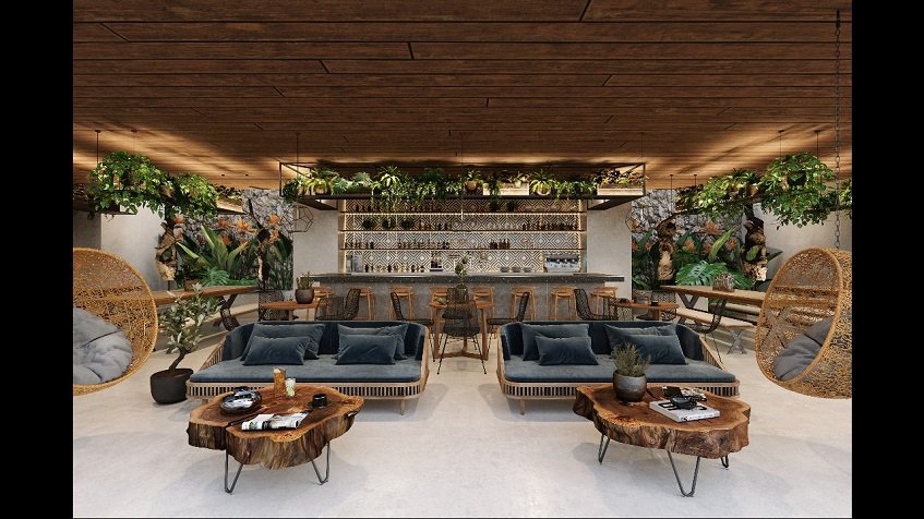 Bar and resting area with cushion sofas and swings at Uxul Tulum by Anah