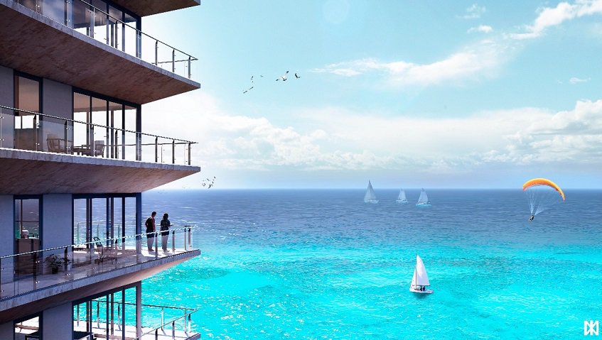Residential building facade with balconies and a couple watching boats on the ocean at The Maria Cozumel