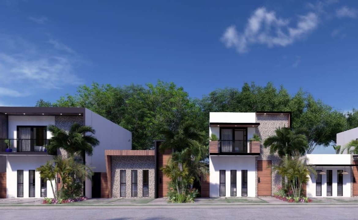 Facades of two houses from the street view at Grand Privada Tulum