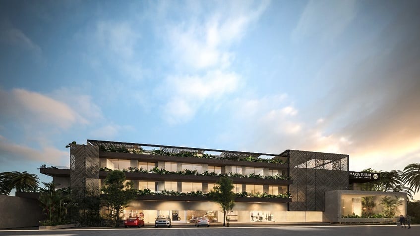 Four level residential building with parking lot at Maria Tulum by Anah