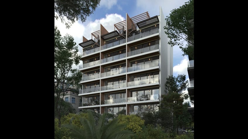 Facade posterior of residential building surrounded by trees at Central Park Quintas