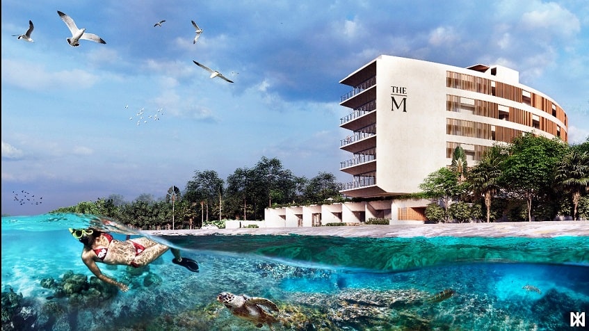 Residential building by the ocean and woman snorkeling with a turtle at The Maria Cozumel