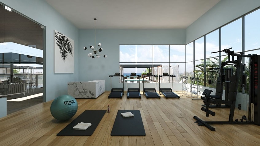 Gym room with treadmill and other exercise equipment at Singular Dream Residence Hotel