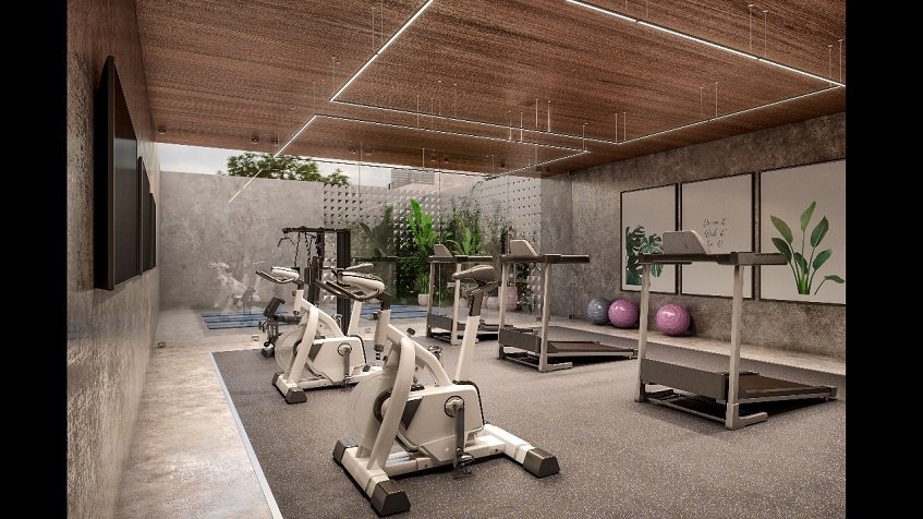Gym with bicycles and treadmills at Uxul Tulum by Anah