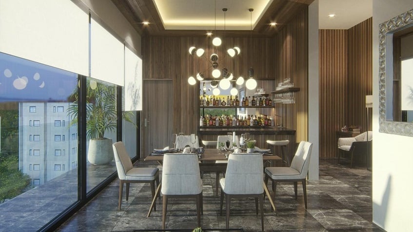 Penthouse dining area in front of mini bar by the glass wall at Musa del Carmen
