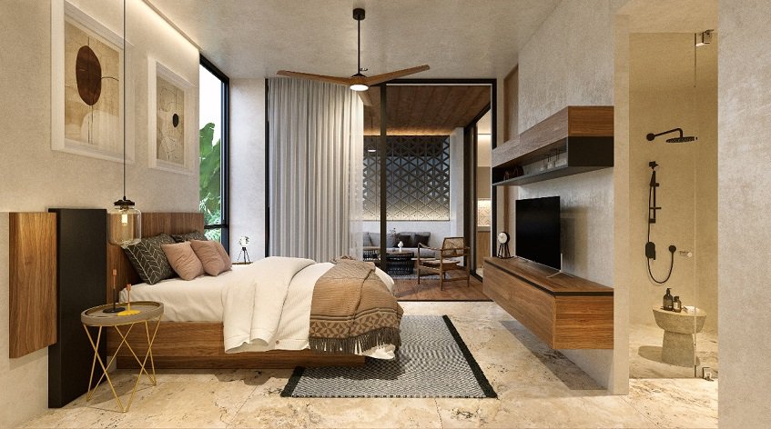 Open bedroom with wall furniture and glass wall shower at Uxul Tulum by Anah