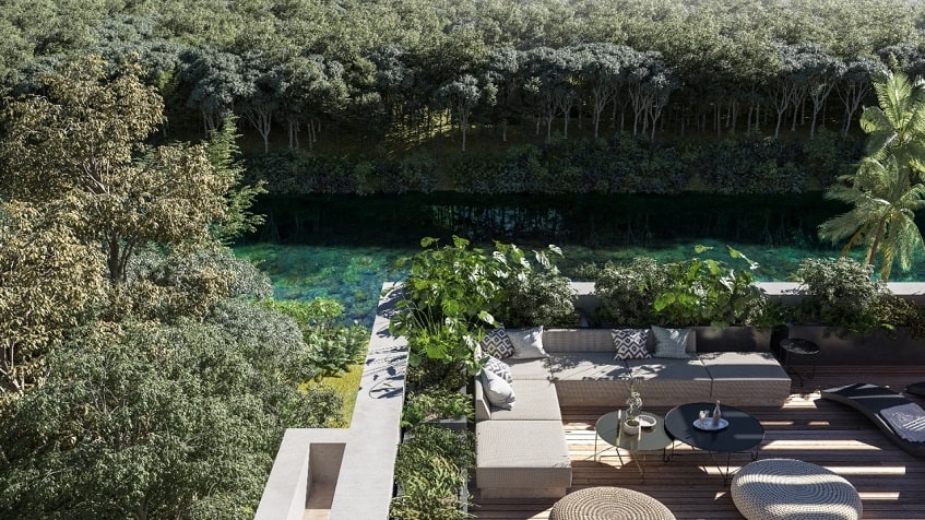 Terrace with sitting area and river jungle view at Reserve at Mayakoba