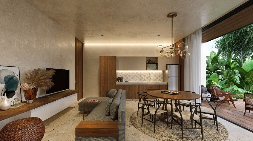 Living room with dining table and terrace divided by sliding door window at Uxul Tulum by Anah