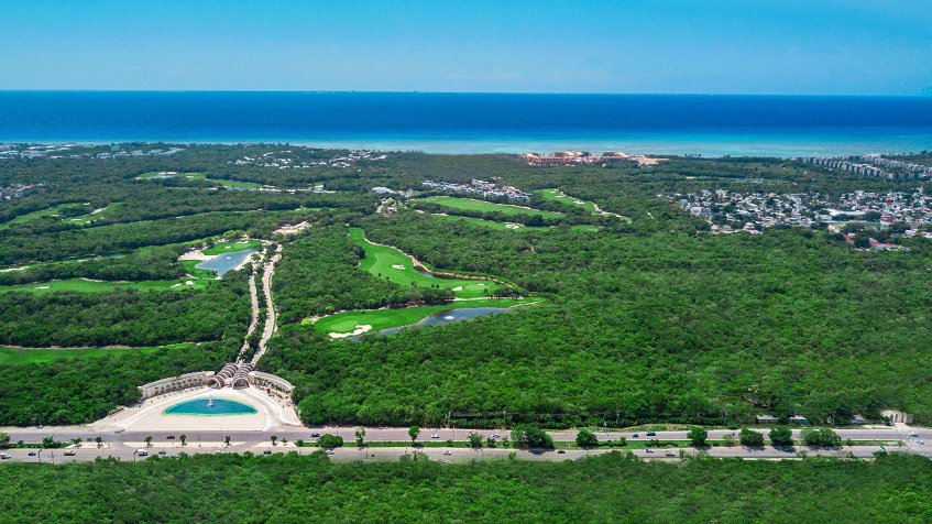 Main gate with golf course view and ocean at Nick Price Residences