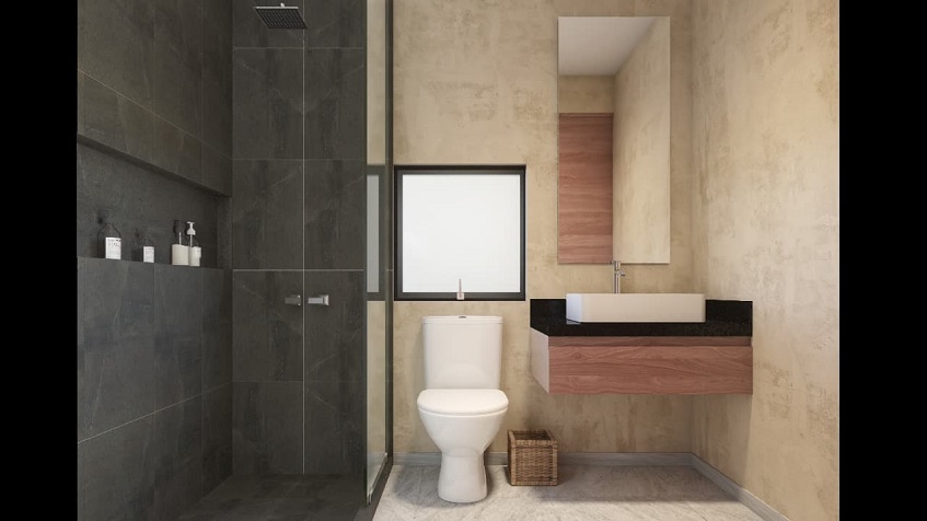 Bathroom with black tiles shower of Vias del Mar Tulum