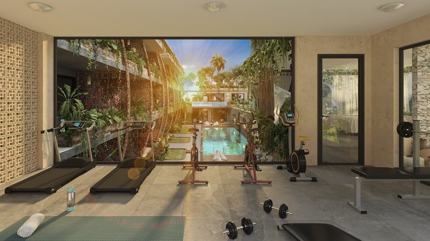 Gym room with the view of swimming pool at Xamira Tulum