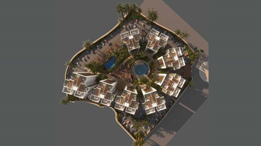 Top view of eight towers and cenote shaped swimming pool at Beyond Towers Cancun
