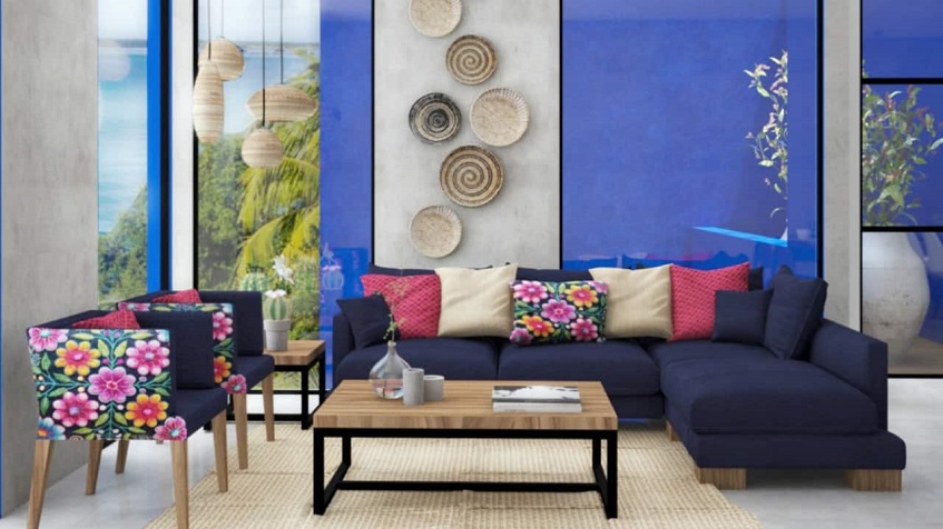Living room with flower decor on the sofa and wooden plates on the wall at Rosa Mexicana