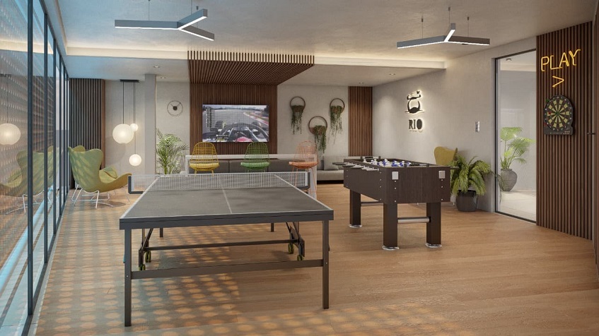 Game room with ping pong table and table football at Rio Aldea Zama