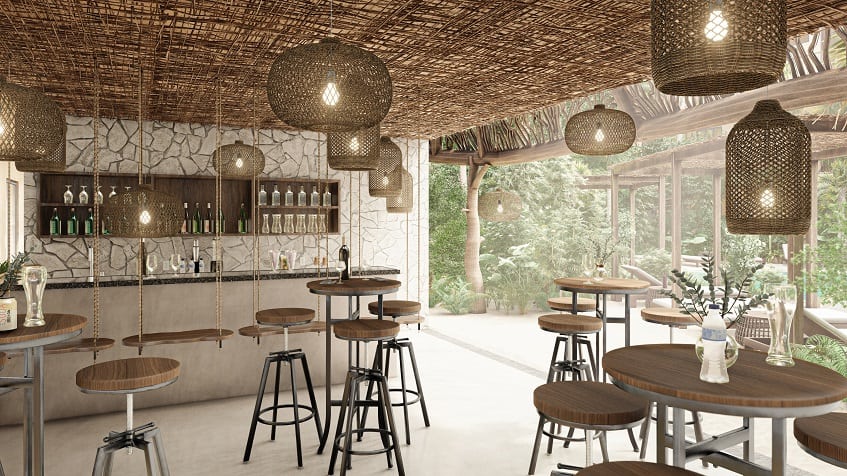 Bar with dining room with open wall to the garden at Elemental Tulum