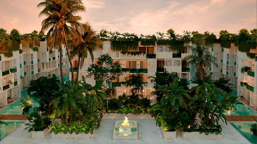 Condominium residential with some buildings, fire pit and swimming pools in Ocean Tulum