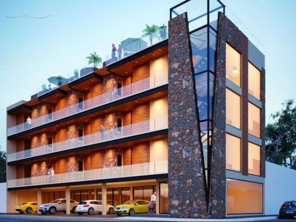 Residential building facade in golden colour at Terra Ego Tulum