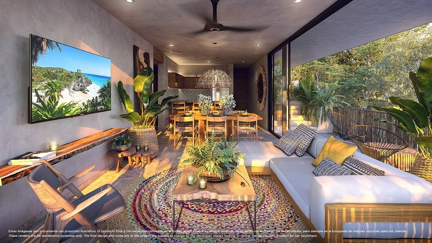 Living room with dining table and wall size window view for terrace at Nativa Tulum