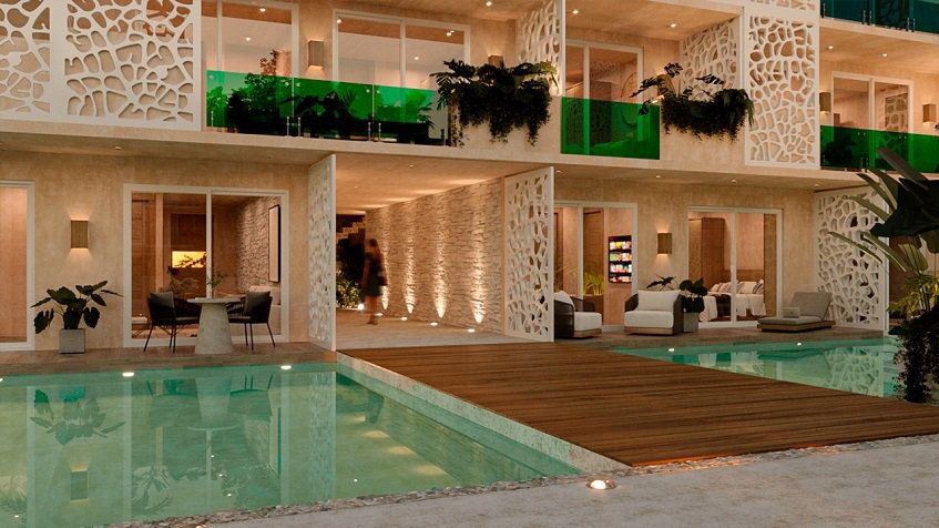 Residential building facade with pool terraces and balconies at Ocean Tulum