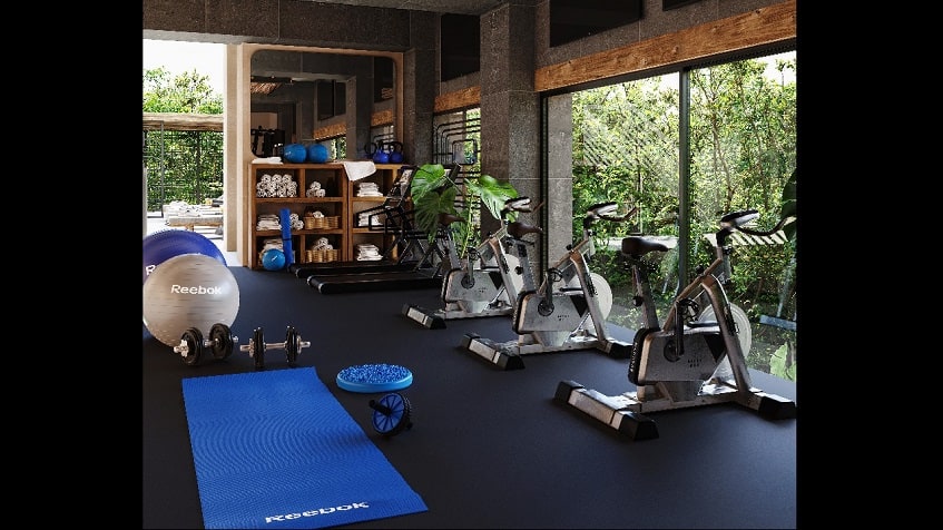 Gym with bicycle and other reebok exercise tools at Talulah Tulum
