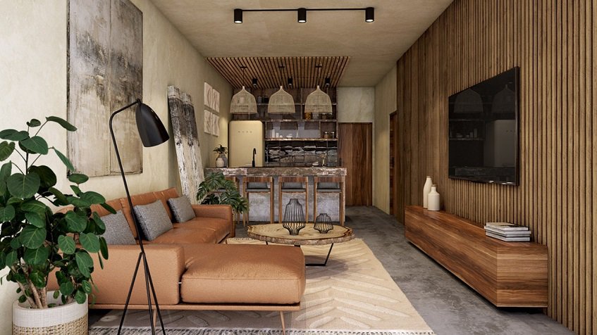 Living room with wooden wall decor and a kitchen at Talulah Tulum