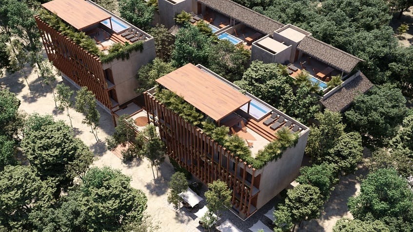 Aerial view of two residential buildings with facilities in the jungle at Homa Kah Tulum