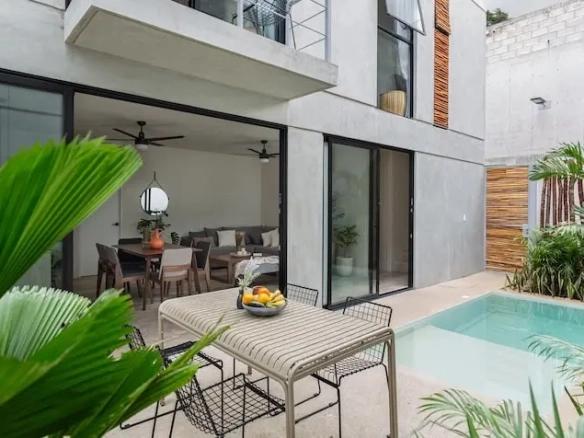 Facade area grill with pool at Seremonia Tulum