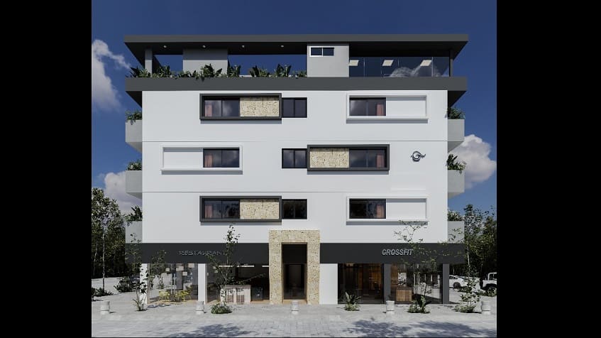 White residential building facade with a rooftop palapa at Lik Zama