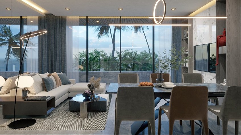 Living room with sofa and large window with a garden view at Distrito Puerto