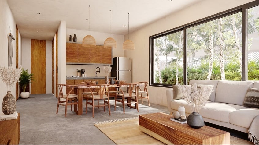 Living and dining area with wooden finishes at Homa Kah Tulum